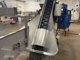 an image of a conveyor belt in a factory