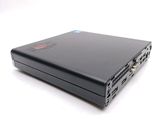 an image of a black laptop computer sitting on top of a white surface