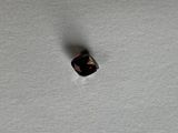 an image of a piece of jewelry on a white surface