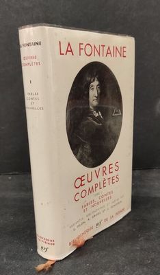 a book with a picture of a woman sitting on top of it