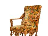 une image d'une chaise avec un dossier rembourré à motifs floraux