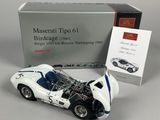 an image of a model of a white race car with a box