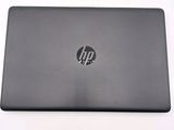 the back of a laptop with the hp logo on it