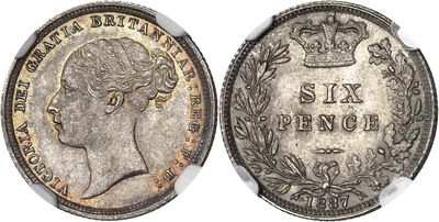 a silver coin with a crown on top of it