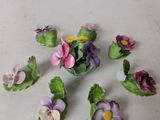 many small flowers that are sitting on a table