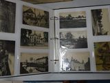 an open book with pictures on it sitting on a table
