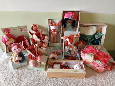 a lot of stuffed animals that are sitting on a table