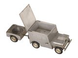 a toy truck that has a cooler on the back of it
