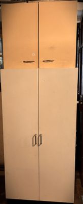 a refrigerator that is sitting in the corner of the room