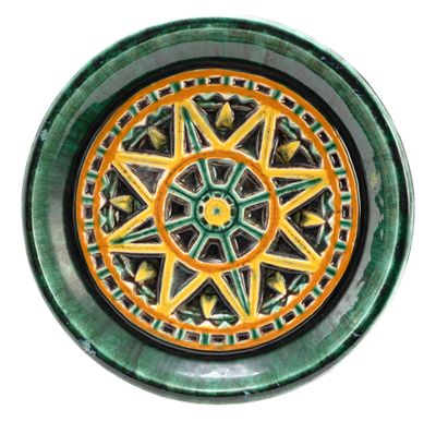 a picture of a green and yellow plate with a star design