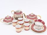 a lot of cups and saucers that are on the table