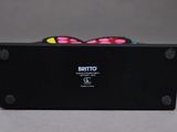 a close up of a black box with a butterfly on it