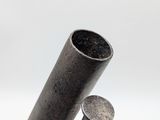 a close up of a metal object with two metal rods sticking out of it
