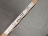 a box with a barcode on it sitting on the ground