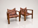 pair of mid - century danish lounge chairs in the manner of hans j wegnel