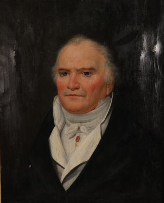 portrait d'un homme en manteau noir et chemise blanche