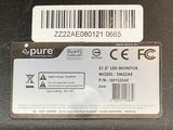 two labels on the back of a laptop that are on a table
