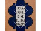 a blue and white sign that says hassan beaded dine elbass sravvi