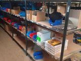 many shelves with boxes and boxes on them in a warehouse