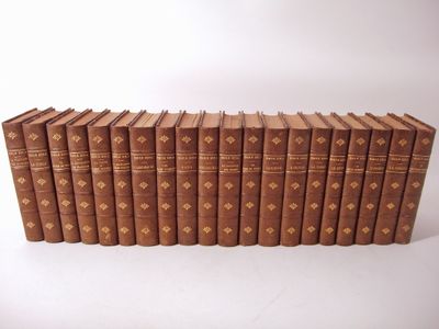 a stack of old books sitting on top of each other