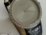 a watch that is sitting on a table with a price tag