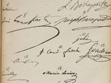 a close up of a book with a bunch of writing on it