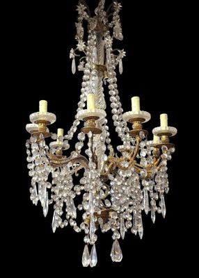 an image of a chandelier with crystal drops hanging from it