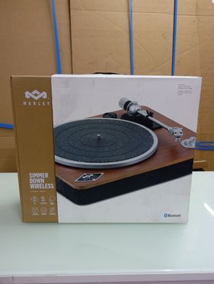 a box with a record player inside of it on a table