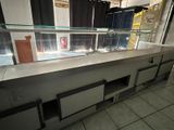 a counter that has a lot of glass on it