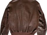 the back of a brown leather jacket on a white background