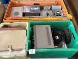 many different types of electronic equipment in the bins