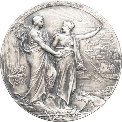 une image représentant une médaille d'argent sur laquelle figurent une femme et un homme