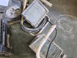 a lot of electrical equipment on the floor in the room