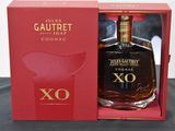 an image of a bottle of cognac xo in a red box