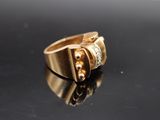 an image of a gold ring with diamonds on it