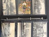 a black binder with pictures of people and buildings on it