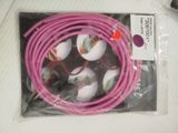 a pink cord that is in a package on a table