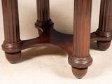 an image of a wooden table with a marble top