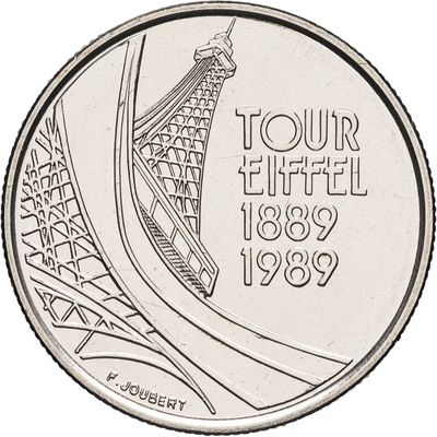 une image d'une pièce de monnaie sur laquelle figure la Tour Eiffel