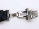 a close up of a watch strap with a buckle on it