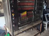 an image of a commercial oven in a garage