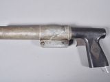 a gun that is sitting on a table