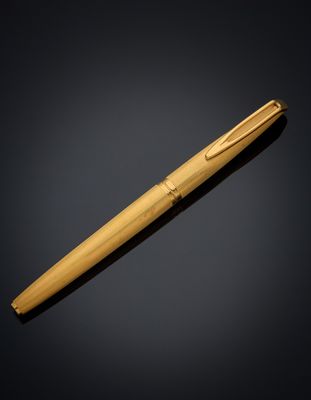 a wooden pen on a black background