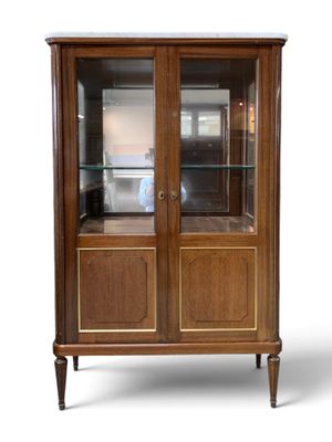 an image of a wooden display cabinet with glass doors