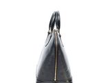 a black handbag on a white background with a zipper