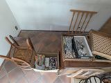 a small table with a chair and a book on it