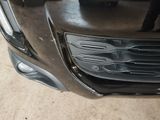 a close up of the front of a car with the hood up