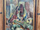 une peinture à l'huile représentant une femme assise sur une chaise devant un tableau