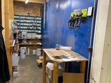 an image of a room with a bunch of tools on the wall