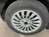 a close up of a tire on a car ' s rim